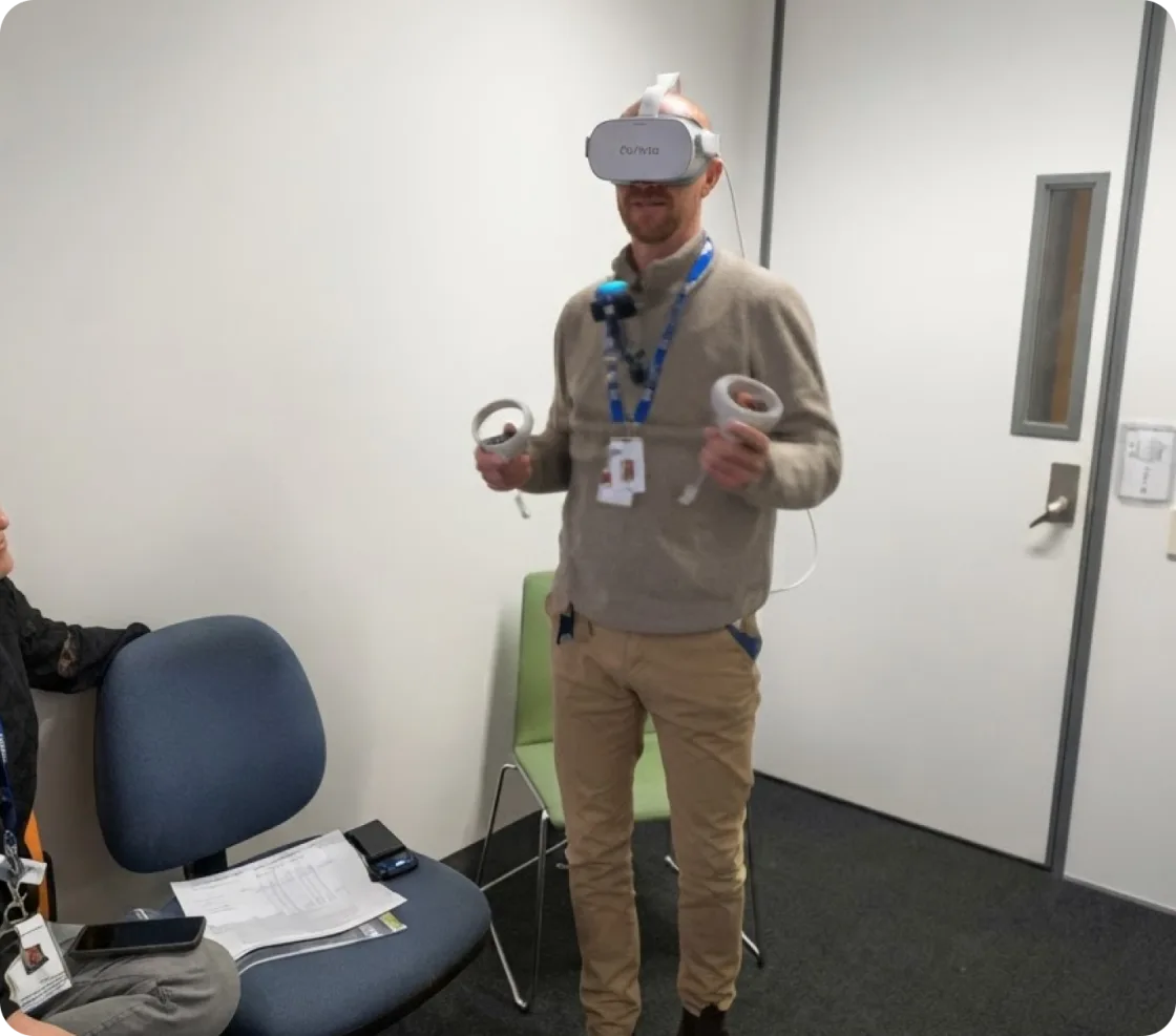 Clinician using a virtual-reality headset during an immersive therapy demonstration