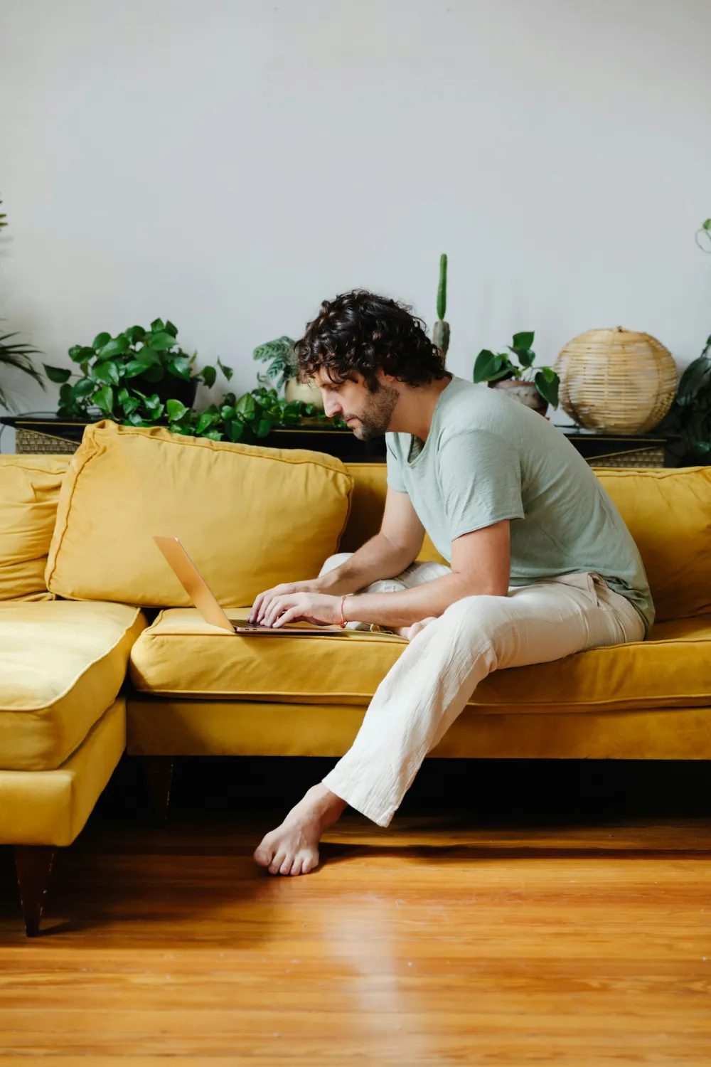 A person exploring the eLEARNING units on a laptop at home